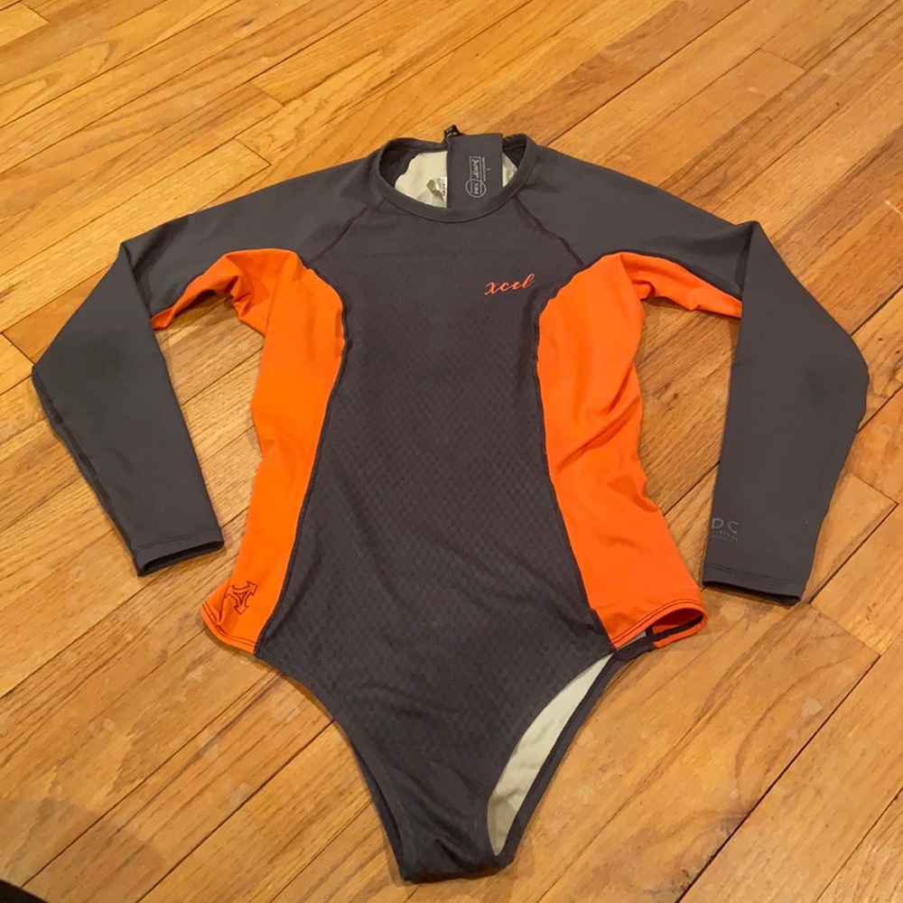 Xcel woman’s one piece rashgaurd in size Small